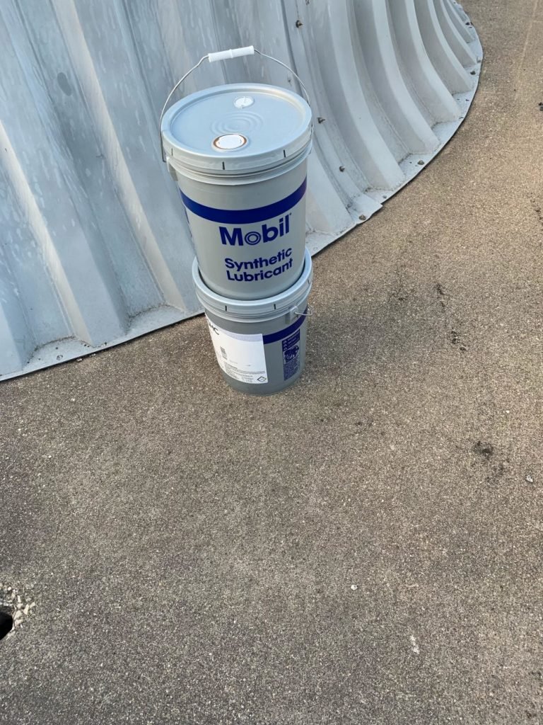 After the repair, gear box oil change with synthetic oil on the cooling tower shaft at the Dallas convention center